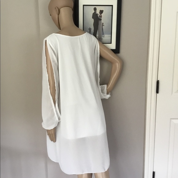 White short brand less dress in medium - Picture 3 of 3